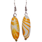 Yellow mismatched earrings. Each earring has a different print design