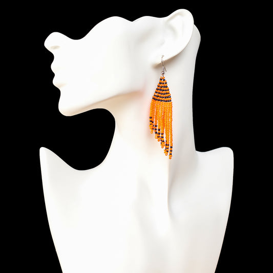 Orange and black beaded tassel earrings