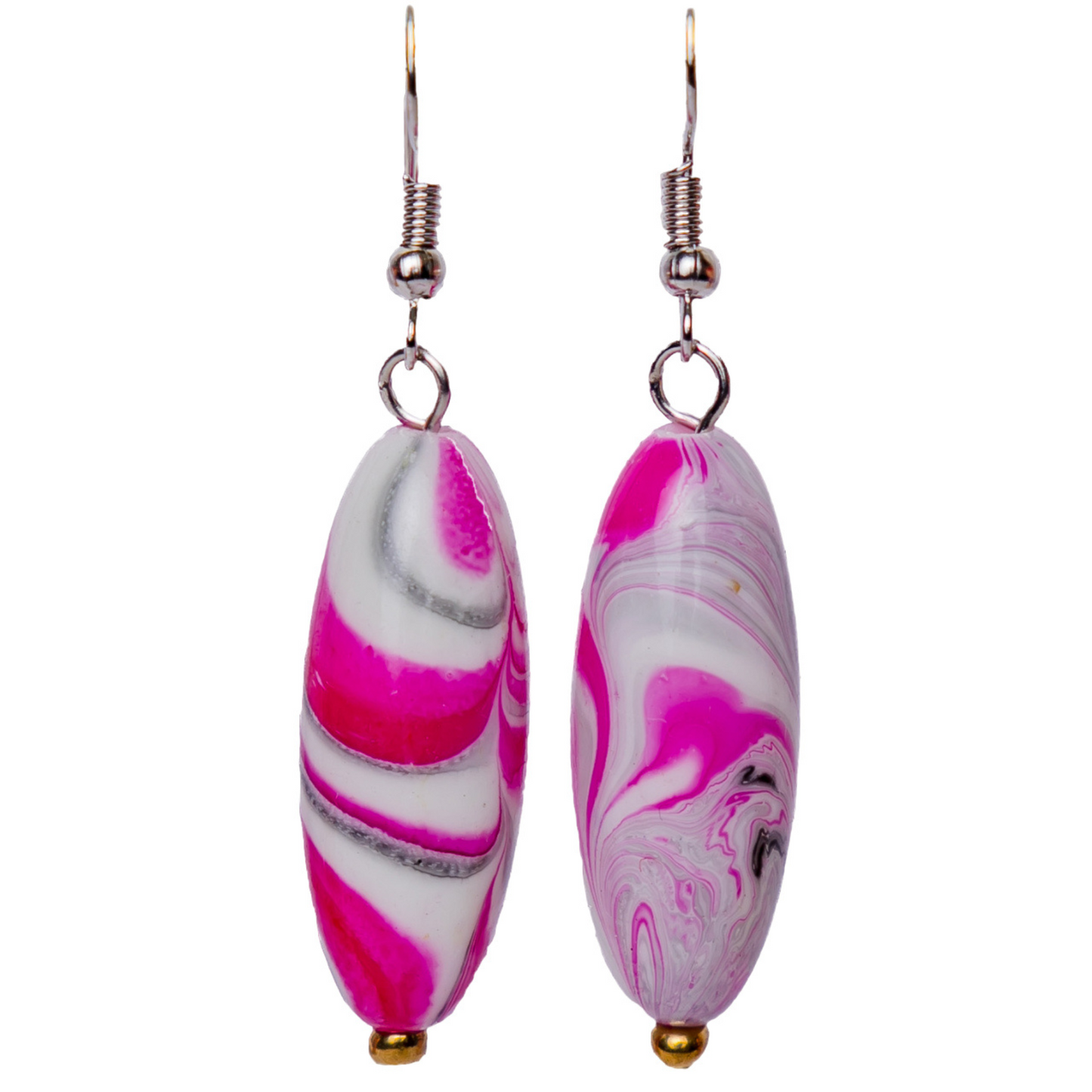 Pink mismatched earrings. Each earring has a unique print.