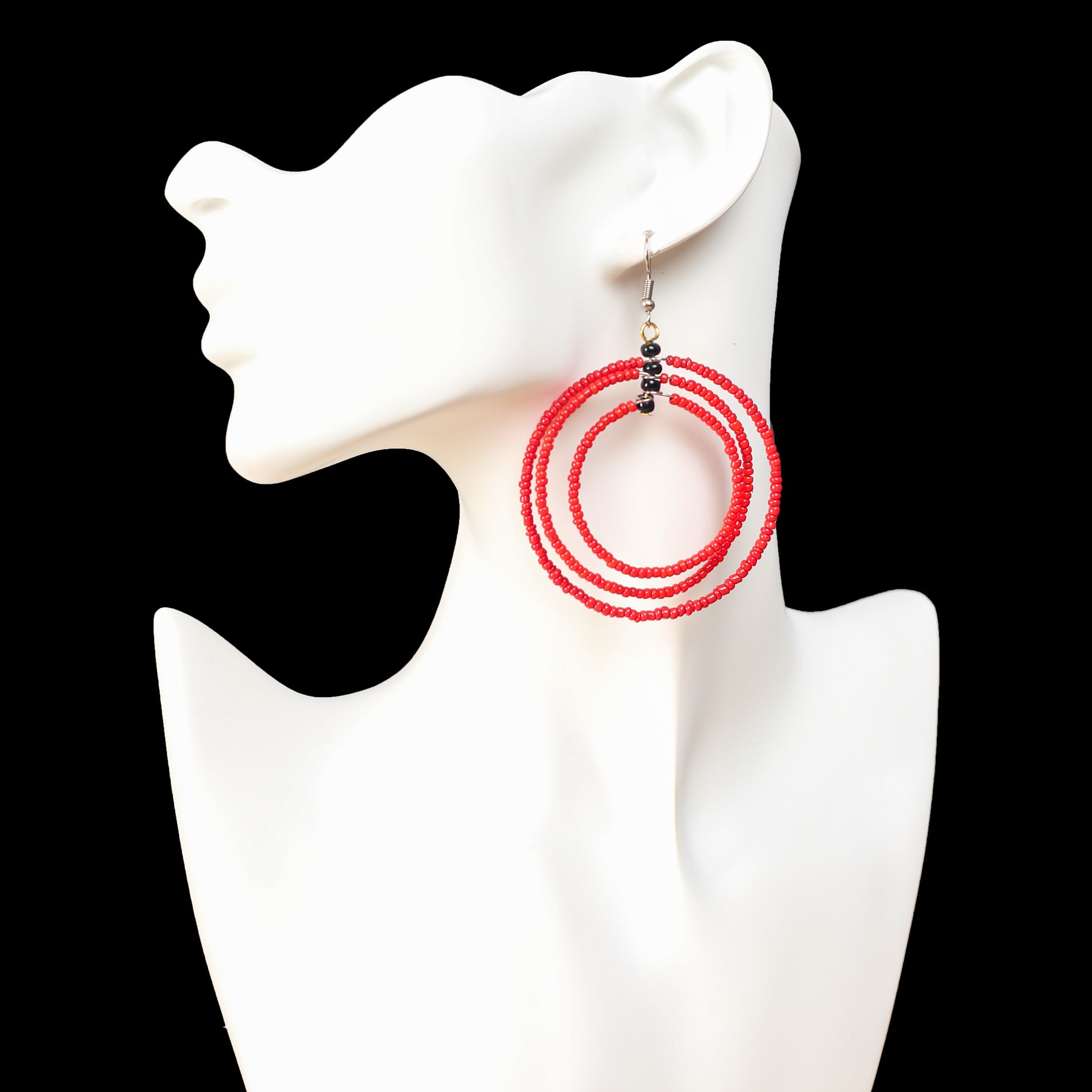 Hoop Earrings made with red beads. They have 3 circles