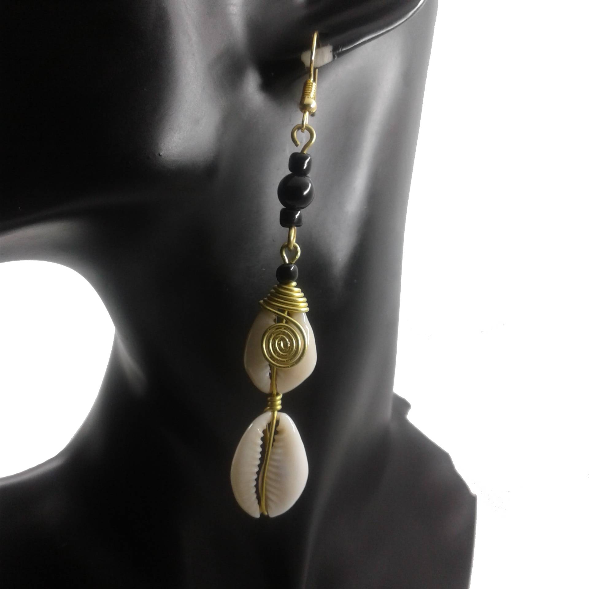 Shell Dangle Earrings on a black mannequin.