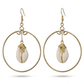 Gold hoop earrings with authentic cowrie shell in the middle. The earrings are on a white background.