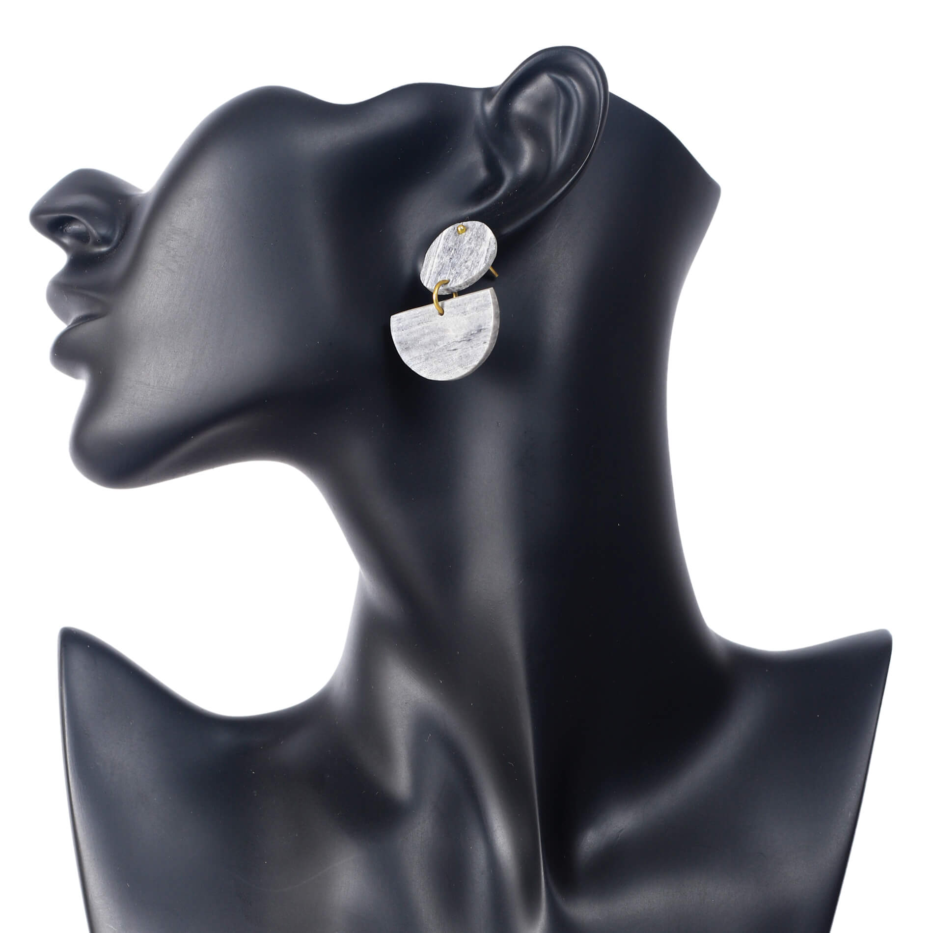 circular disc stud and a dangling semi-circle camel bone earrings