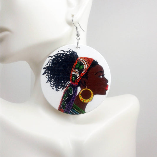 Round Wooden African Earrings featuring a beautiful black woman with braids wearing a headwrap.