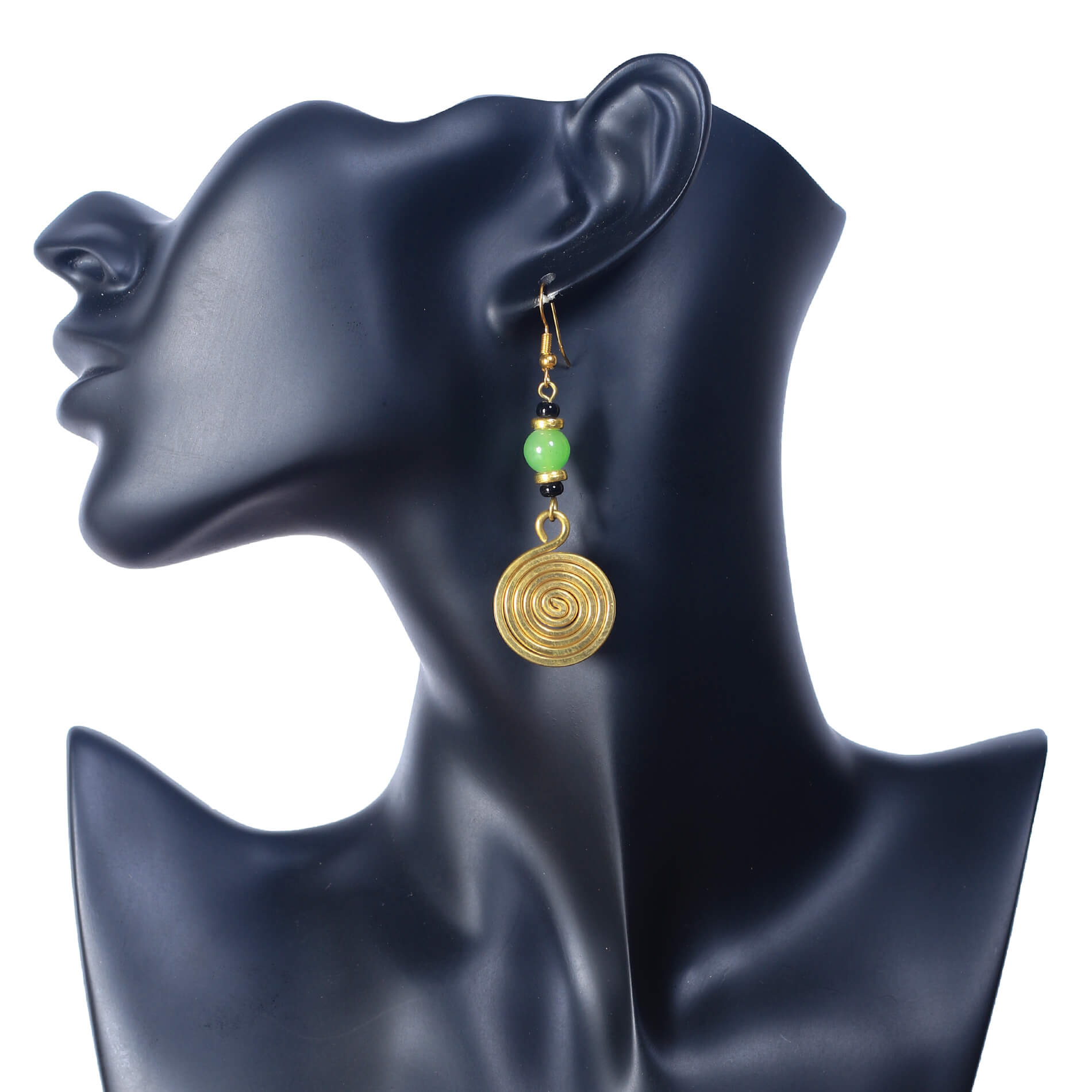 African-inspired dangle earrings with a gold-plated spiral disc and a stack of vibrant green and black beads.