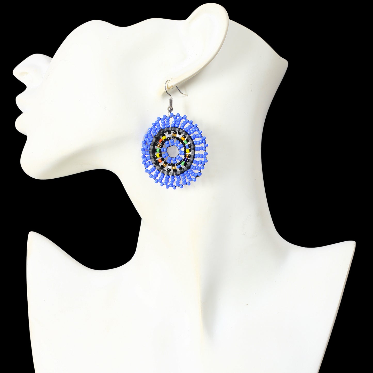 A pair of hand-woven blue beaded disc earrings with a multicolor inner concentric circle pattern.