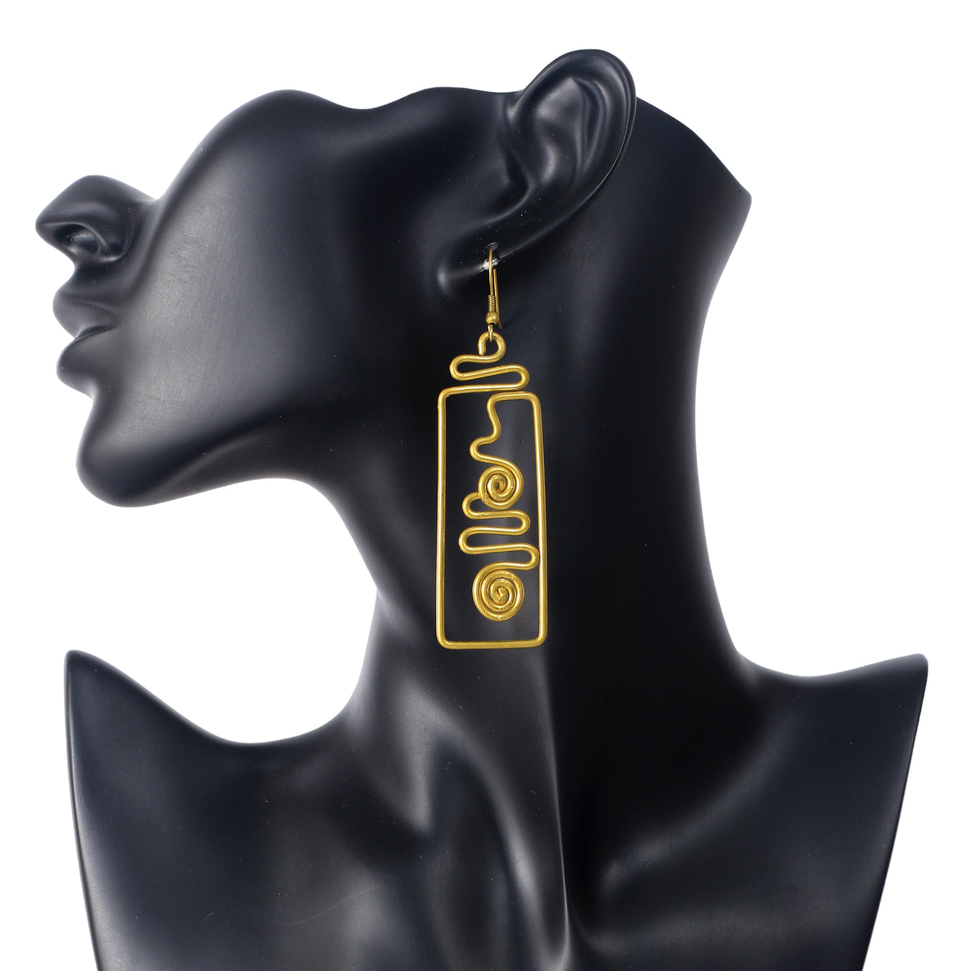 A pair of long, gold-plated geometric earrings with a rectangular frame and an abstract spiral wire design inside
