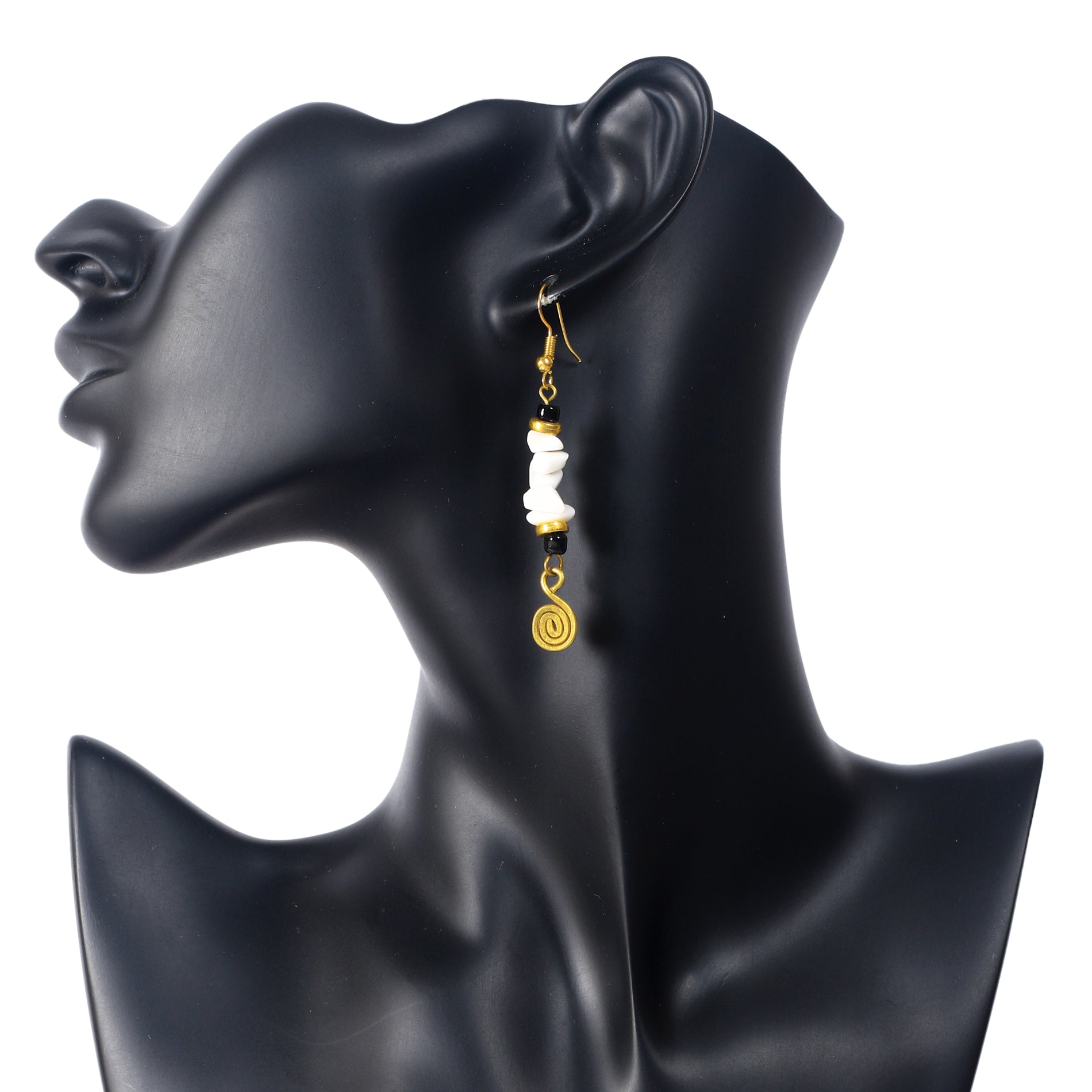 Long gold dangle earrings with white stone chips, black beads, and a gold-plated spiral charm.