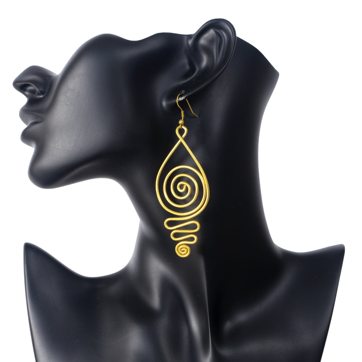 A pair of large, gold-plated wire earrings in a teardrop shape, filled with an intricate spiral pattern.