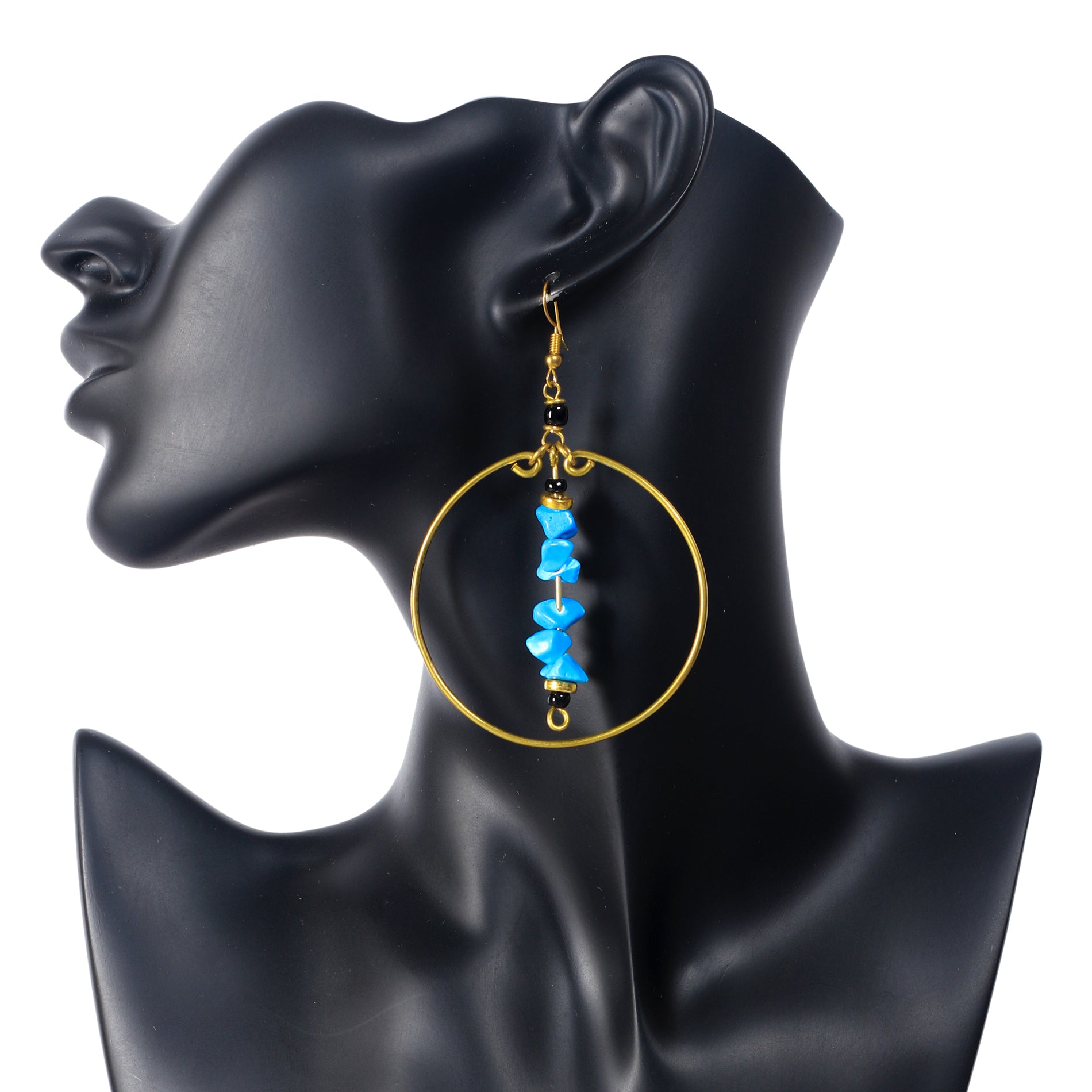 A pair of large, gold-plated hoop earrings with a central bar of vibrant blue stone chips and black bead accents.