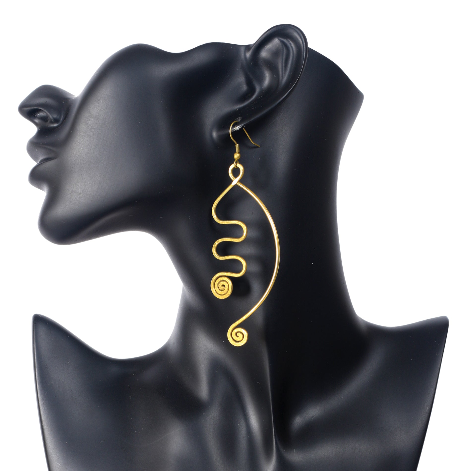 A pair of large, gold-plated wire earrings in a free-form, sculptural design with abstract spirals and curves.