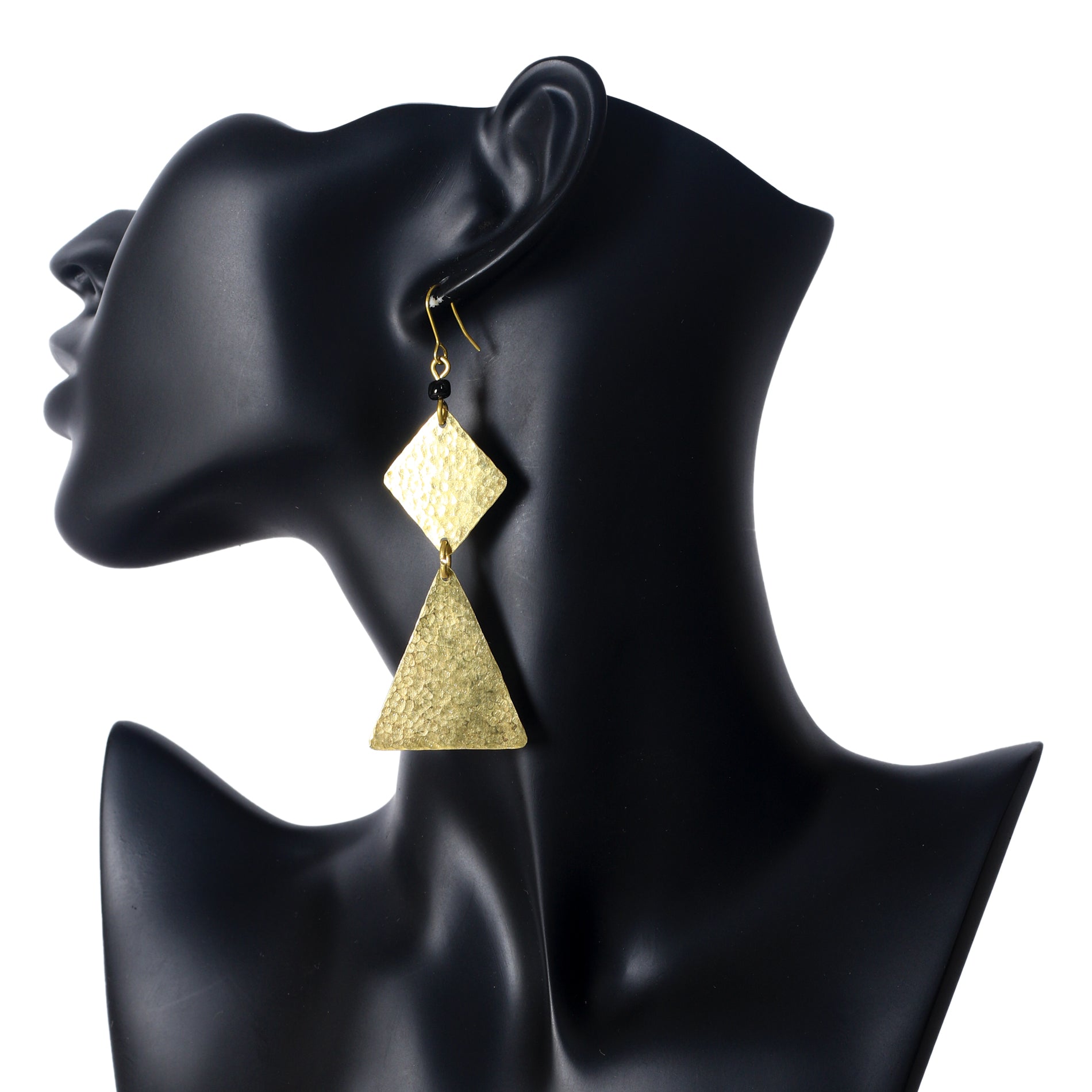 A pair of long, hammered gold-plated earrings with a stacked diamond shape and a large triangle drop.