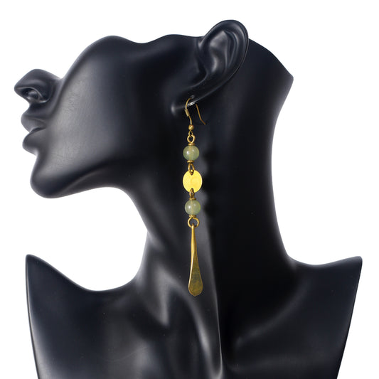 Long gold-plated dangle earrings with marbled green stone beads, a flat disc, and a long tapered paddle drop.