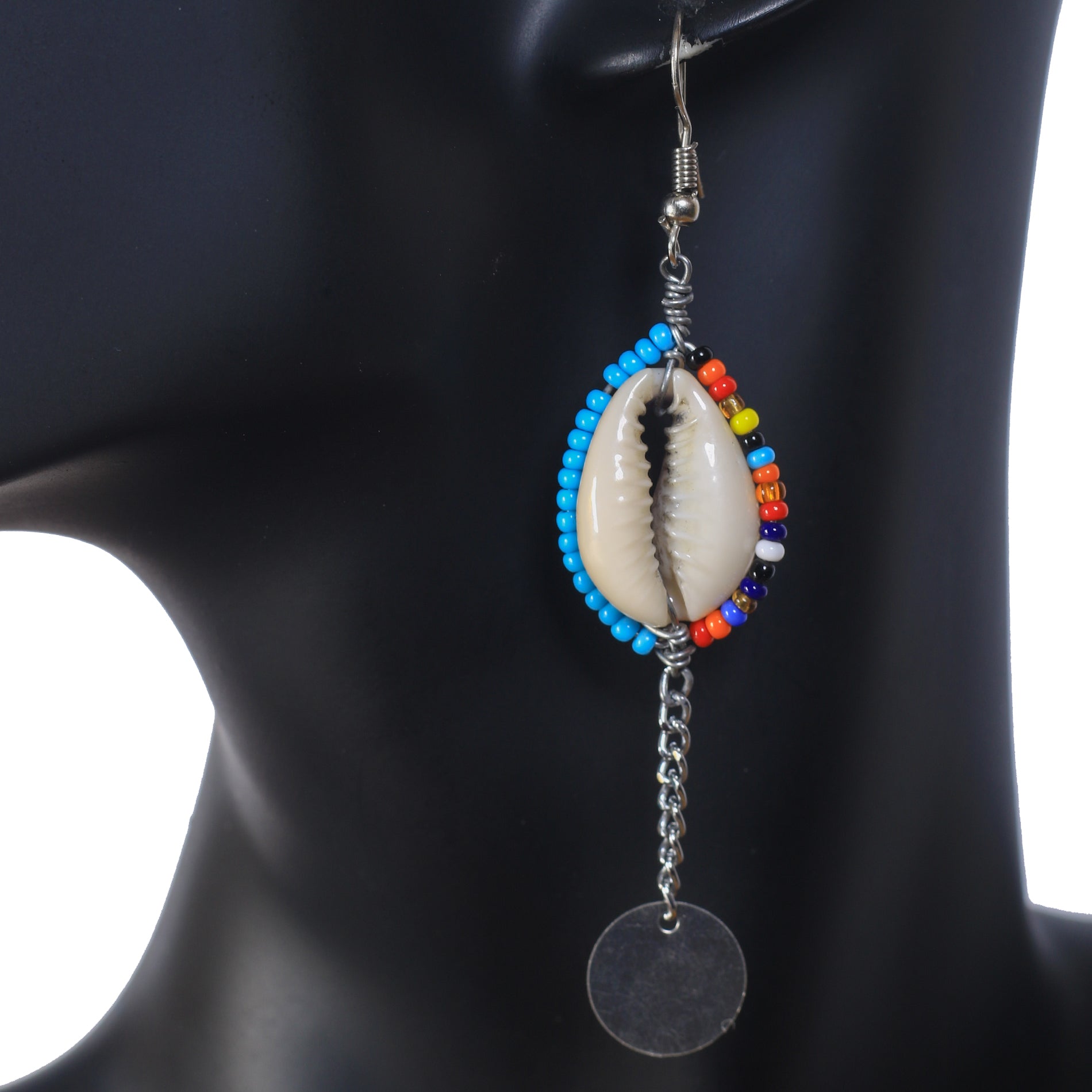 Long dangle earrings with a multicolor beaded cowrie shell, a silver-plated chain, and a round disc drop.