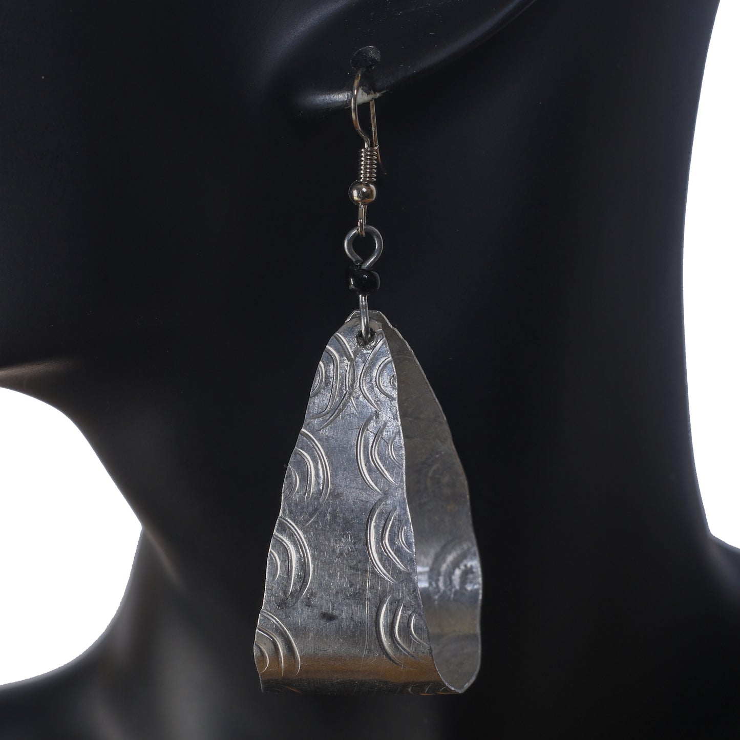 A pair of lightweight, hollow, open-teardrop hoop earrings with a brushed silver-plated finish.