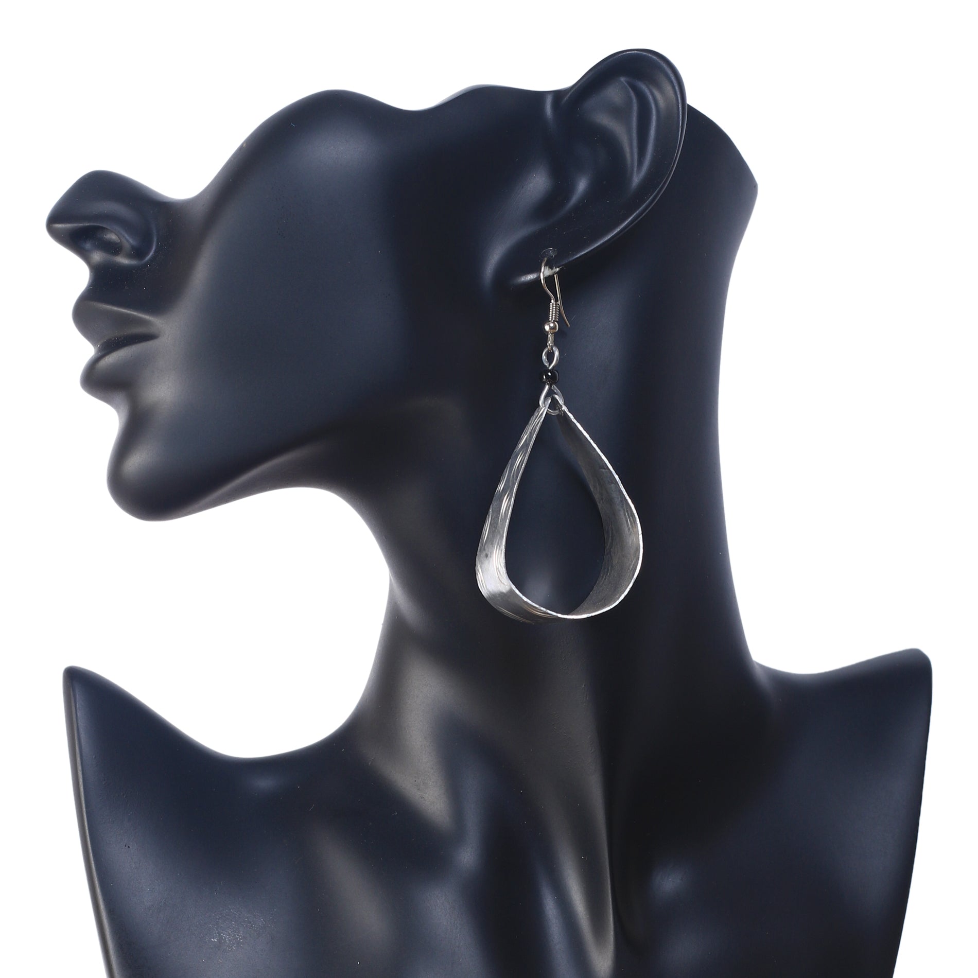 A pair of lightweight, hollow, open-teardrop hoop earrings with a brushed silver-plated finish.